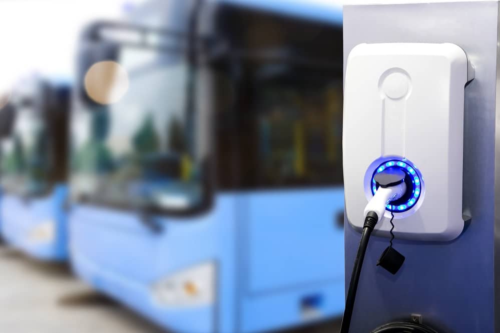Electric buss charging station shutterstock_1557570704